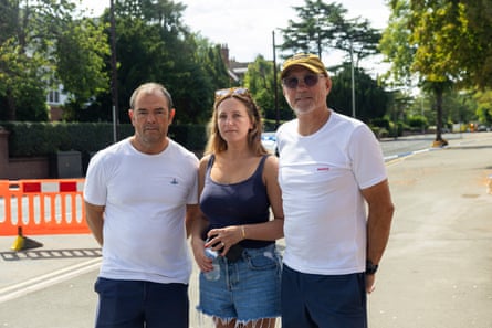From left: Andy Hobbs, Gemma Hobbs and neighbour John Bairner, were evacuated from their homes on Osmaston Road.Photograph: Fabio De Paola/The Guardian