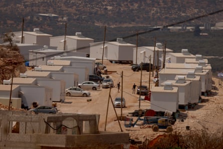 Israeli settlers re-established Ganim on 13 August 2026, starting with two dozen prefabricated homes.Photograph: Alaa Badarneh/EPA