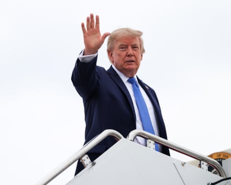 President Donald Trump waves as he boards Air Force One at Joint Base Andrews, Maryland, 14 August 2026.Photograph: Samuel Corum/Getty Images