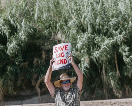 A person protesting against the building of a wall at the Big Bend national park.Photograph: Hannah Gentiles