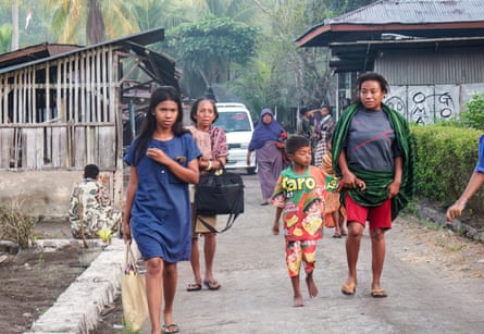 People are forced to leave their homes in Talibura village, Sikka, East Nusa Tenggara.Photograph: Arnold Welianto/AFP/Getty