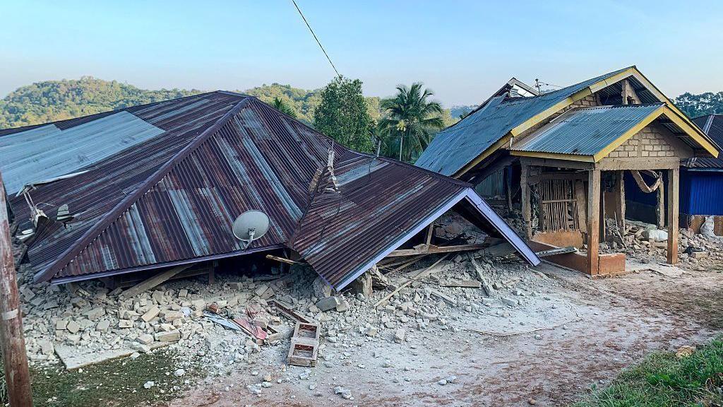 Image caption,More than 150 houses have been severely damaged, as well as a number of other public facilities