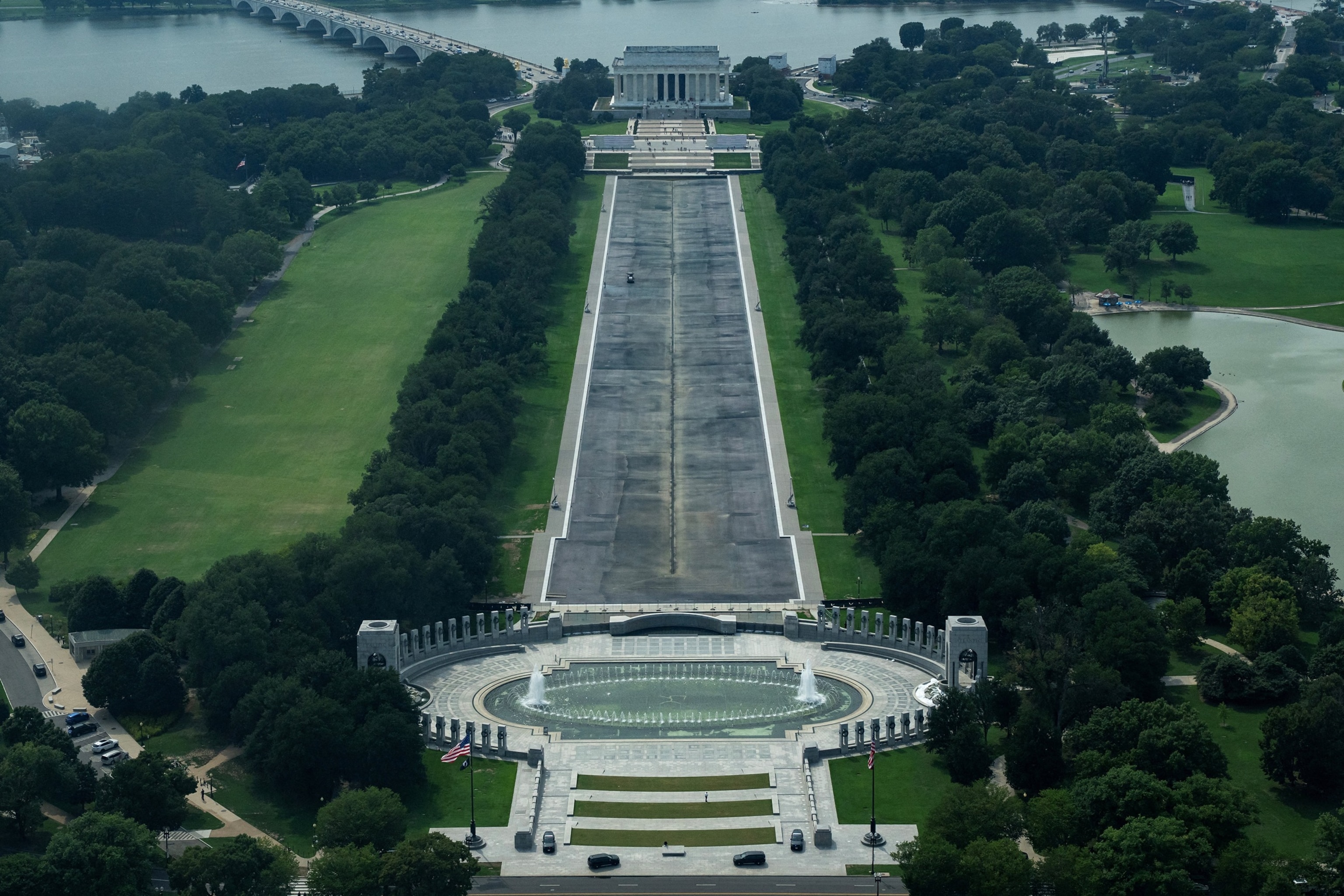 Construction crews continue to work on the Lincoln Memorial Reflecting Pool as seen from a window at the Washington Monument, in Washington, D.C., Aug. 13, 2026.Nathan Howard/Reuters