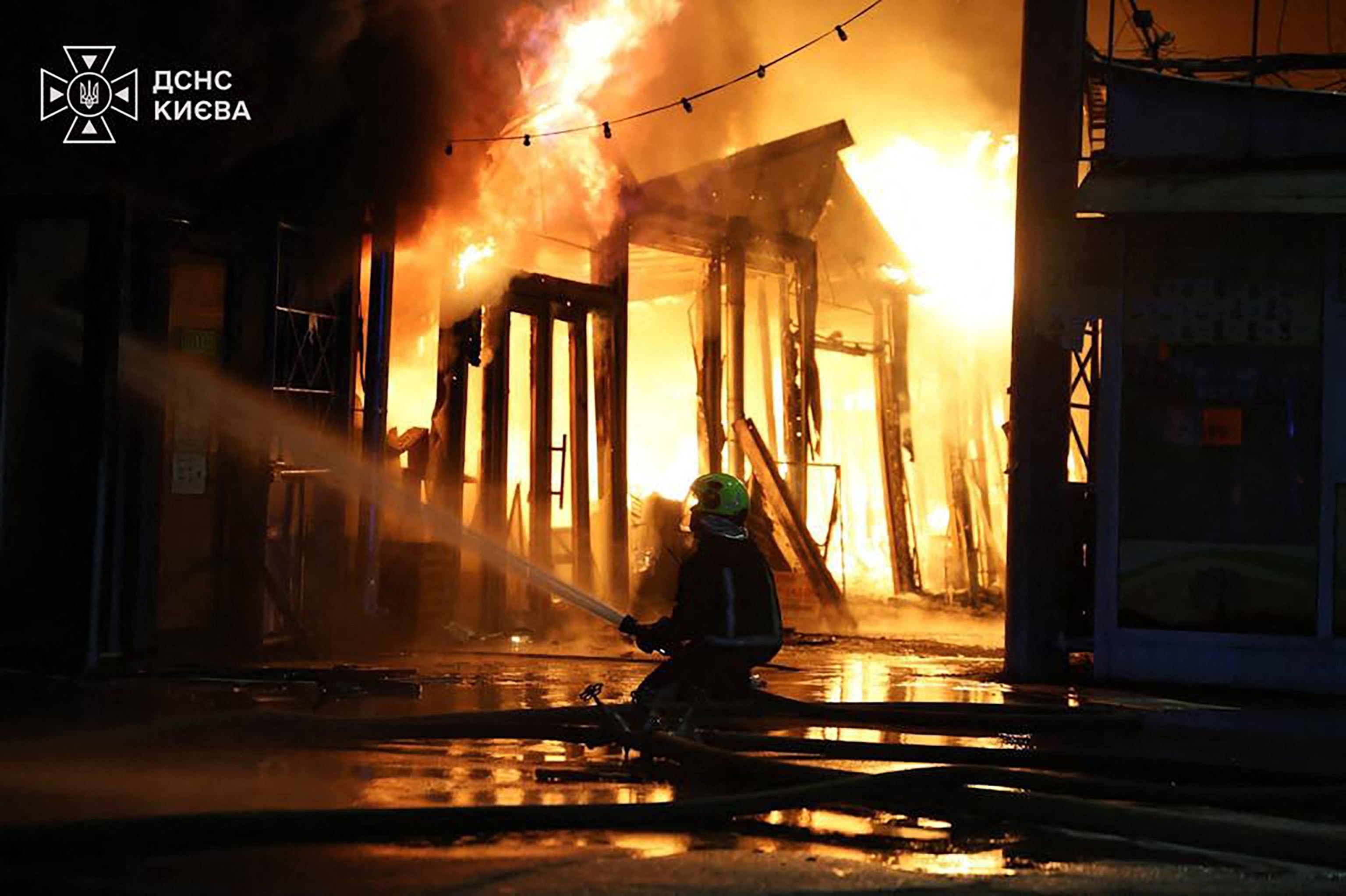 This handout photograph taken and released by the Ukrainian State Emergency Service on Aug. 16, 2026 shows rescuers working at the site of a Russian strike in Kyiv.Handout/Ukrainian State Emergency Servic