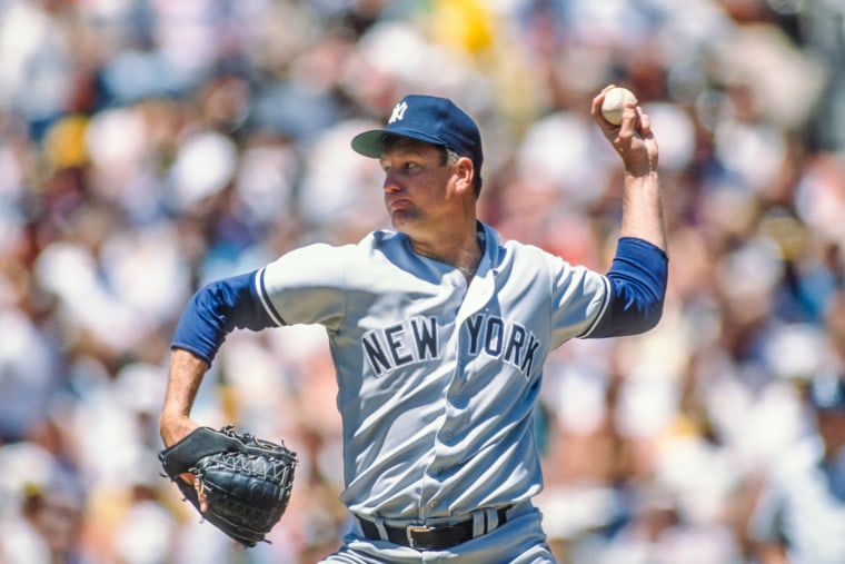 Tommy John of the New York Yankees pitches during a game against the Oakland Athletics in 1989.David Madison / Getty Images file