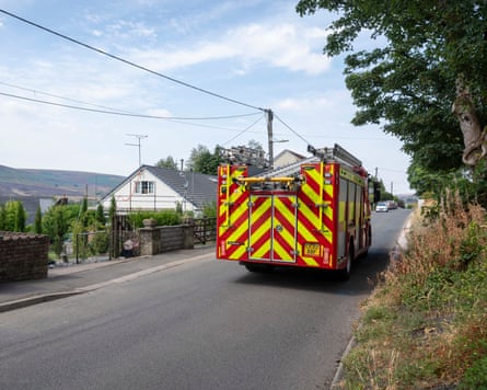 A fire engine hits the road.Photograph: Adrian Sherratt/The Guardian