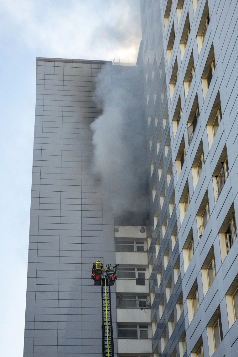 Emergency vehicles at the scene of the fire in Berlin on Friday.Christophe Gateau / dpa/picture alliance via Getty Images