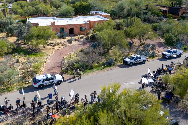 Law enforcement and news broadcasters outside Nancy Guthrie's residence in Tucson, Ariz., on Feb. 10.Brandon Bell / Getty Images