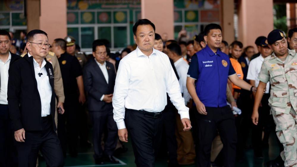 Image caption,Visiting the school after the shooting, Thai Prime Minister Anutin Charnvirakul promised new gun laws