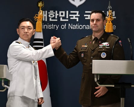 Col Jang Do-young (left) of the South Korean chiefs of staff and Col Ryan Donald of the US command at a joint press briefing.Photograph: Song Kyung-Seok/AFP/Getty Images