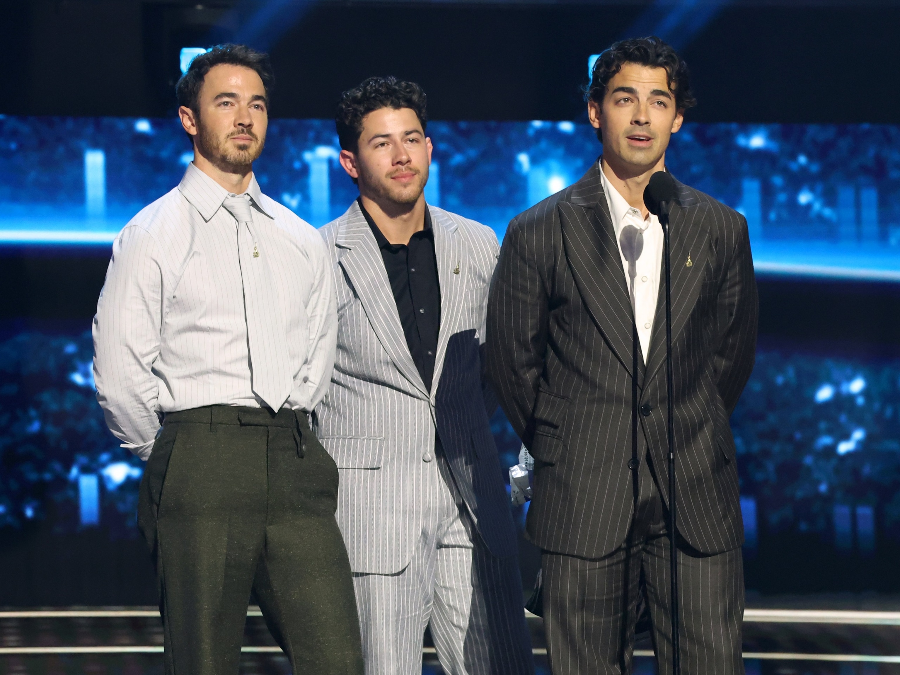 Disney Legends award recipients (L-R) Kevin Jonas, Nick Jonas and Joe Jonas of The Jonas Brothers speak onstage at the Disney Entertainment Showcase at D23: Legends on August 16, 2026 in Anaheim, California.Kevin Mazur/Getty Images for Dis