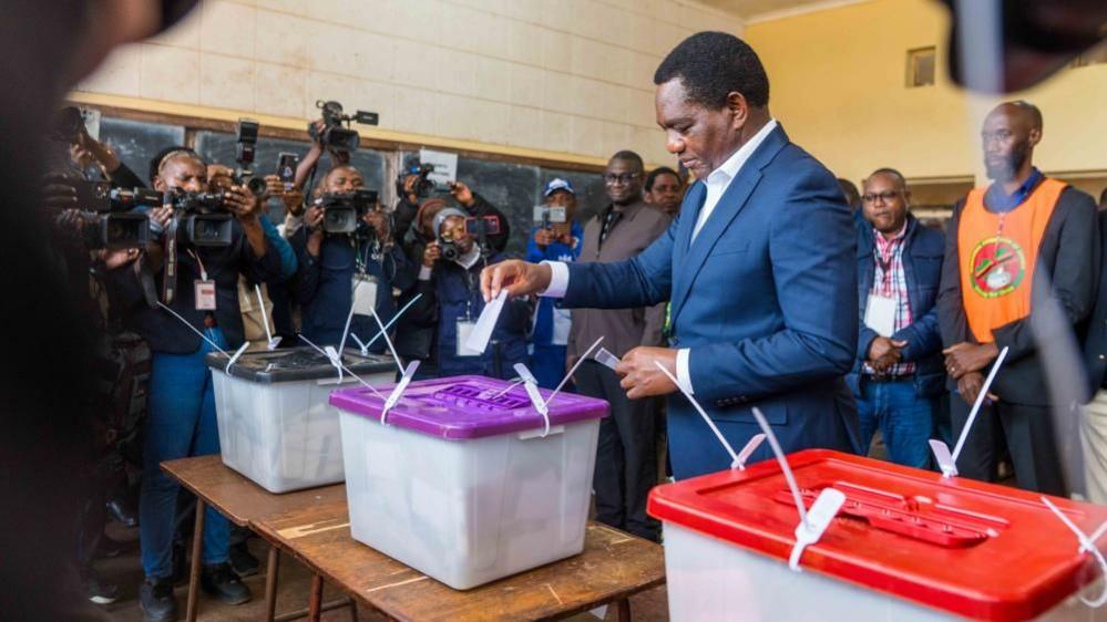 Image caption,President Hakainde Hichilema is hoping to win a second five-year term