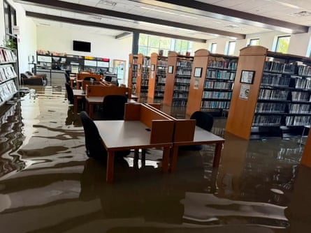 Floodwater inside the Yorktown Public Library in Yorktown, Indiana, on 13 August.Photograph: Yorktown Public Library/AFP/Getty Images
