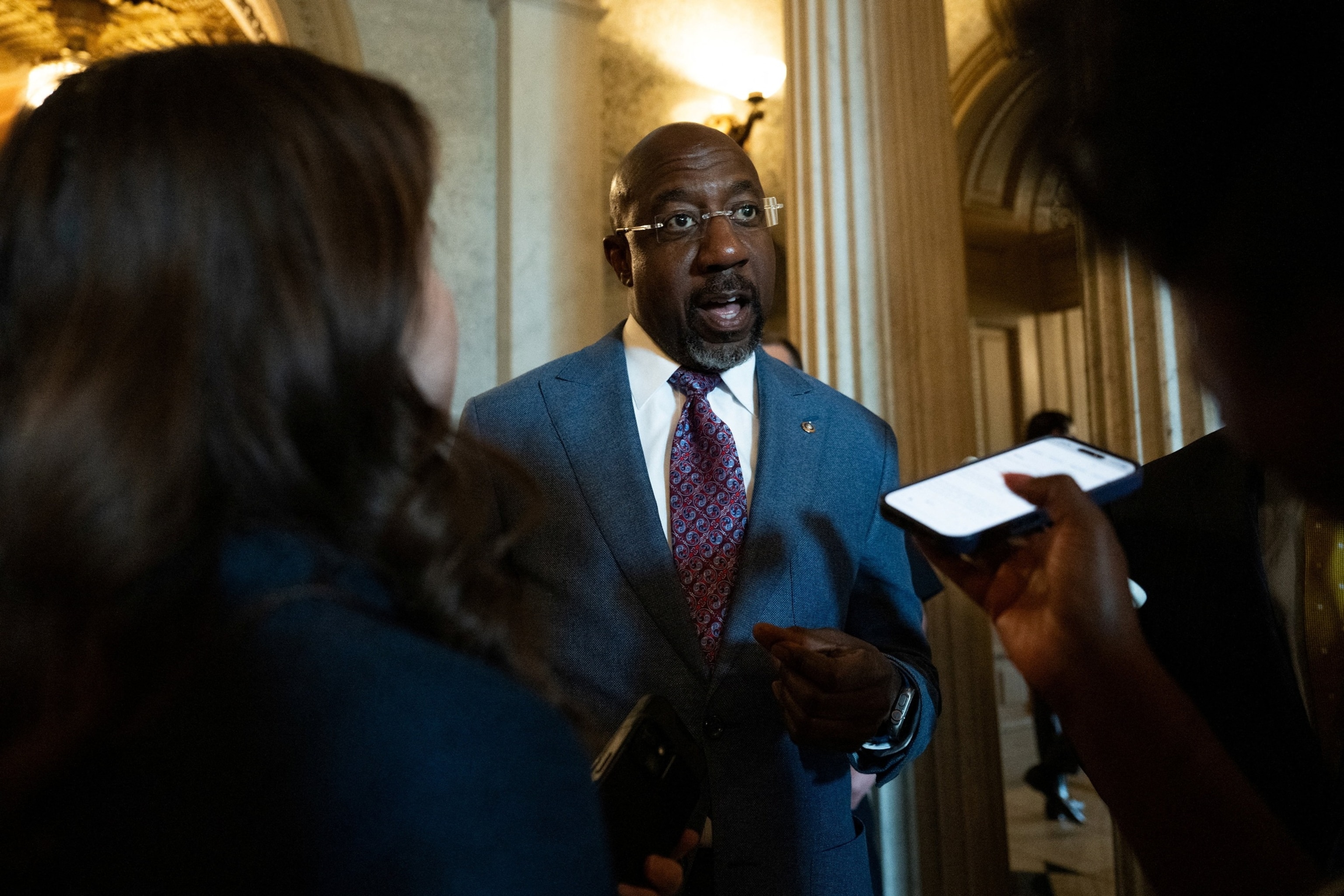 Senator Raphael Warnock speaks to reporters on Capitol Hill., July 22, 2026.Annabelle Gordon/Reuters