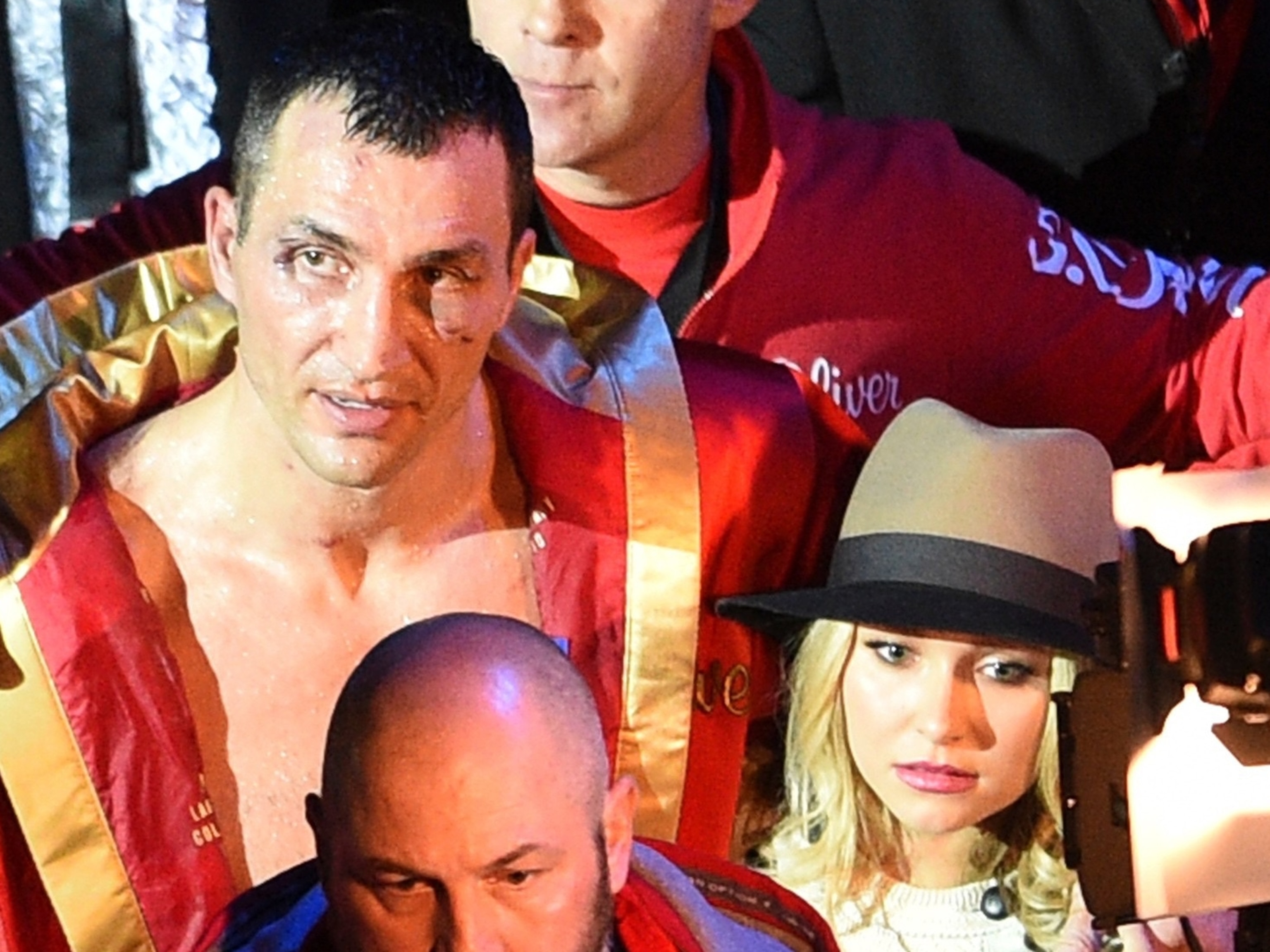 Ukraine's Wladimir Klitschko and Hayden Panettiere, right, leave the hall after Klitschko lost to Britain's Tyson Fury in a world heavyweight title fight for Klitschko's WBA, IBF, WBO and IBO belts in Duesseldorf, western Germany, on Nov. 29, 2015.Sebastian Konopka/AP Photo