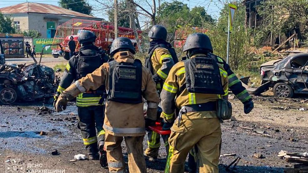 Image caption,Two Russian missiles killed 10 people early on Tuesday in the centre of the village of Pechenihy, officials said
