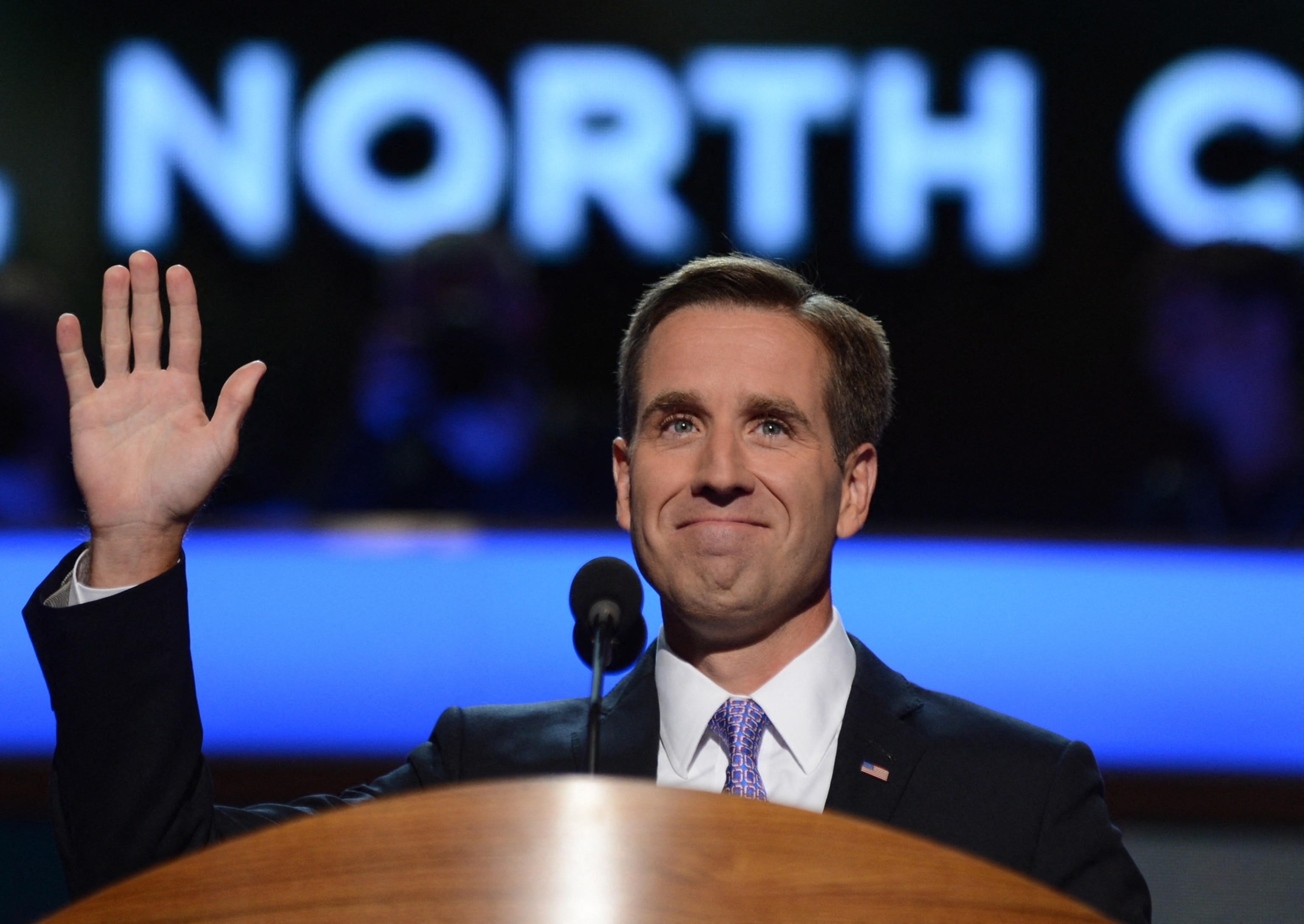 Attorney General of Delaware and Son of Vice President Joe Biden Beau Biden waves at the Time Warner Cable Arena in Charlotte, N.C., Sept. 6, 2012, on the final day of the Democratic National Convention (DNC).Robyn Beck/AFP via Getty Images