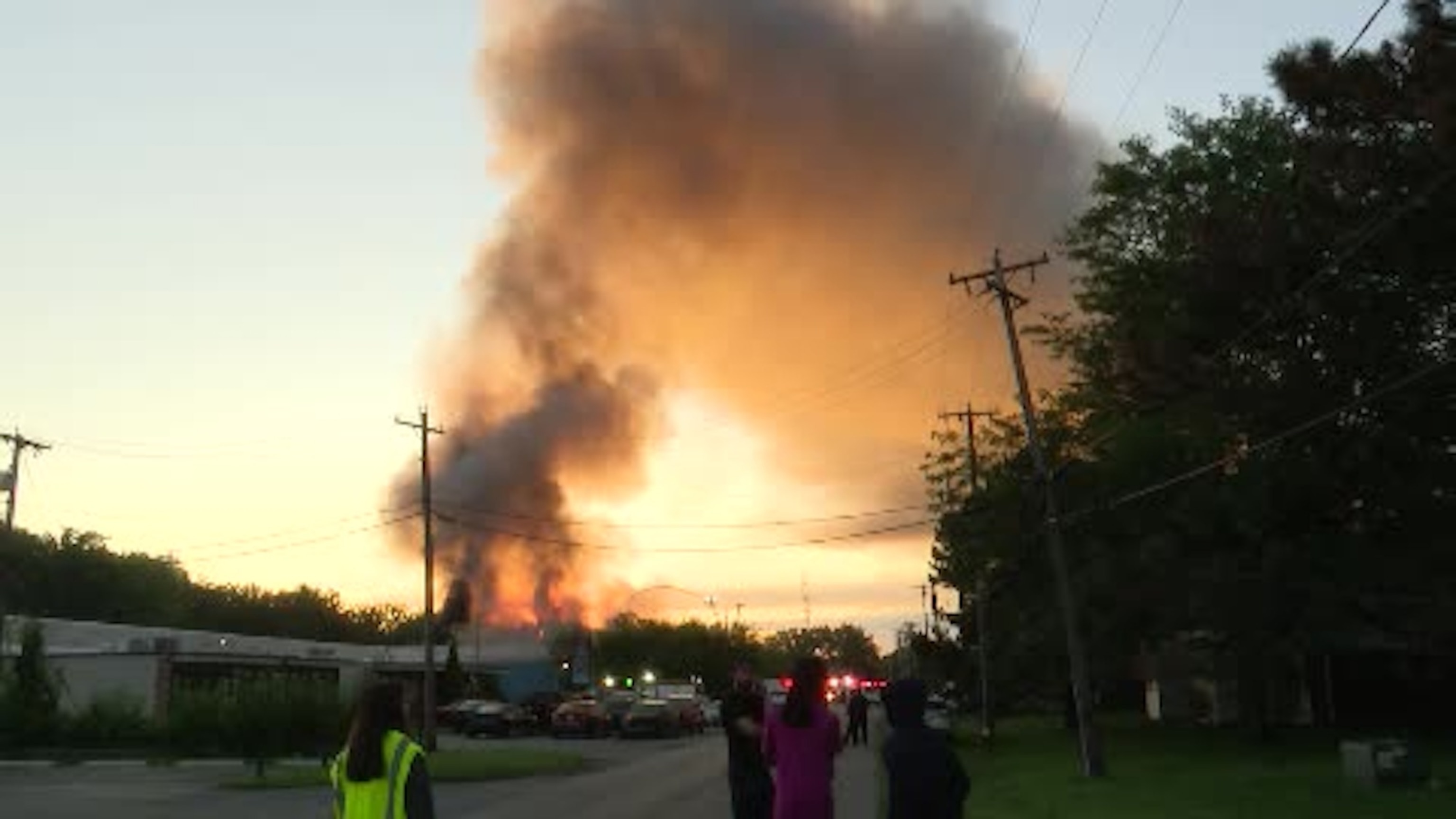 A plume of black smoke rises from an industrial facility in Toledo, Ohio, where a series of explosions occurred, August 18, 2026WTVG