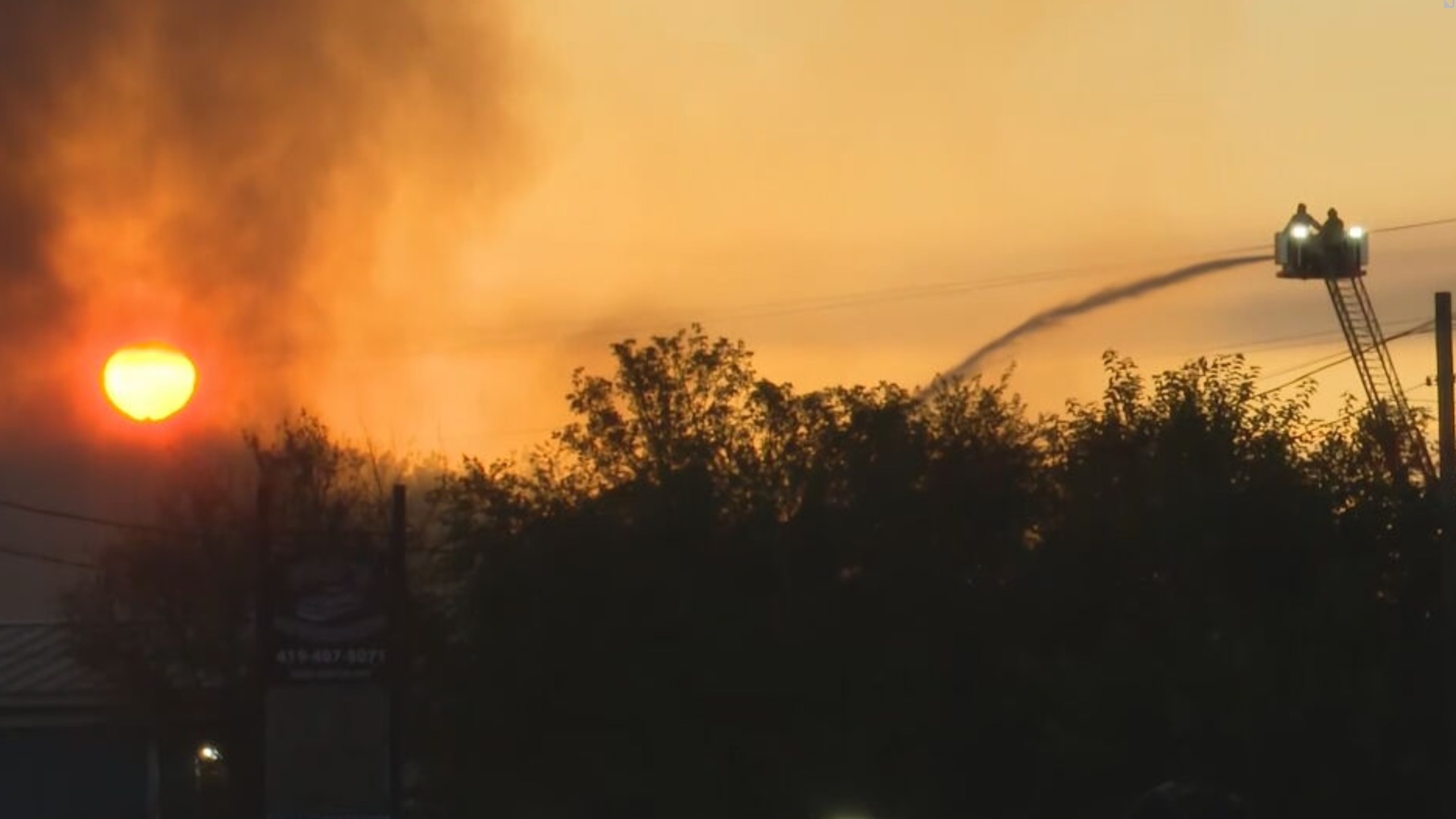 Firefighters battle a blaze that broke out after an explosion erupted at an industrial facility in Toledo, Ohio, August 18, 2026.WTVG