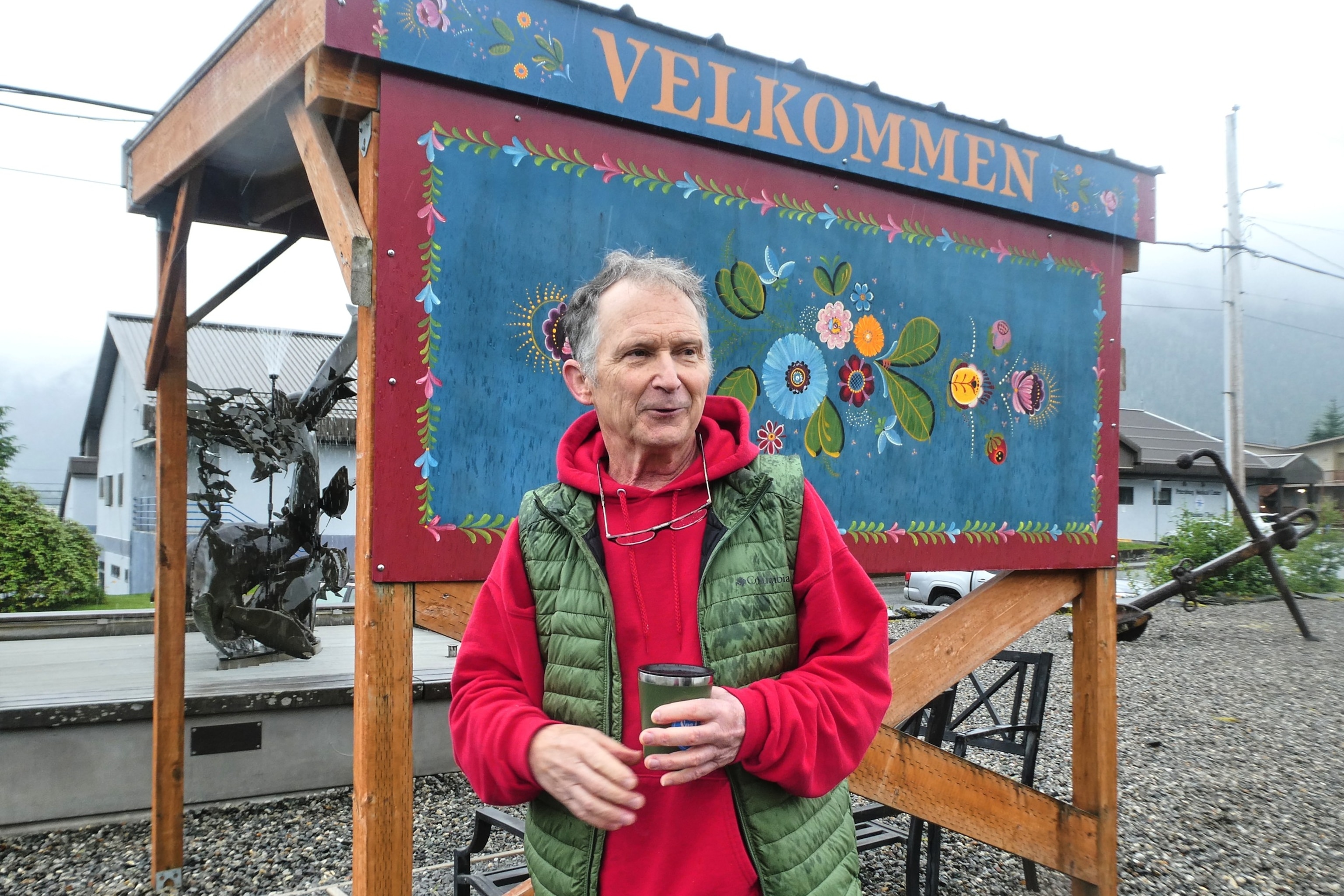 Dan J. Sullivan, a candidate in Alaska's U.S. Senate race who shares a name with the incumbent seeking reelection, talks in front of a welcome sign near downtown Petersburg, Alaska, on July 3, 2026.Becky Bohrer/AP Photo