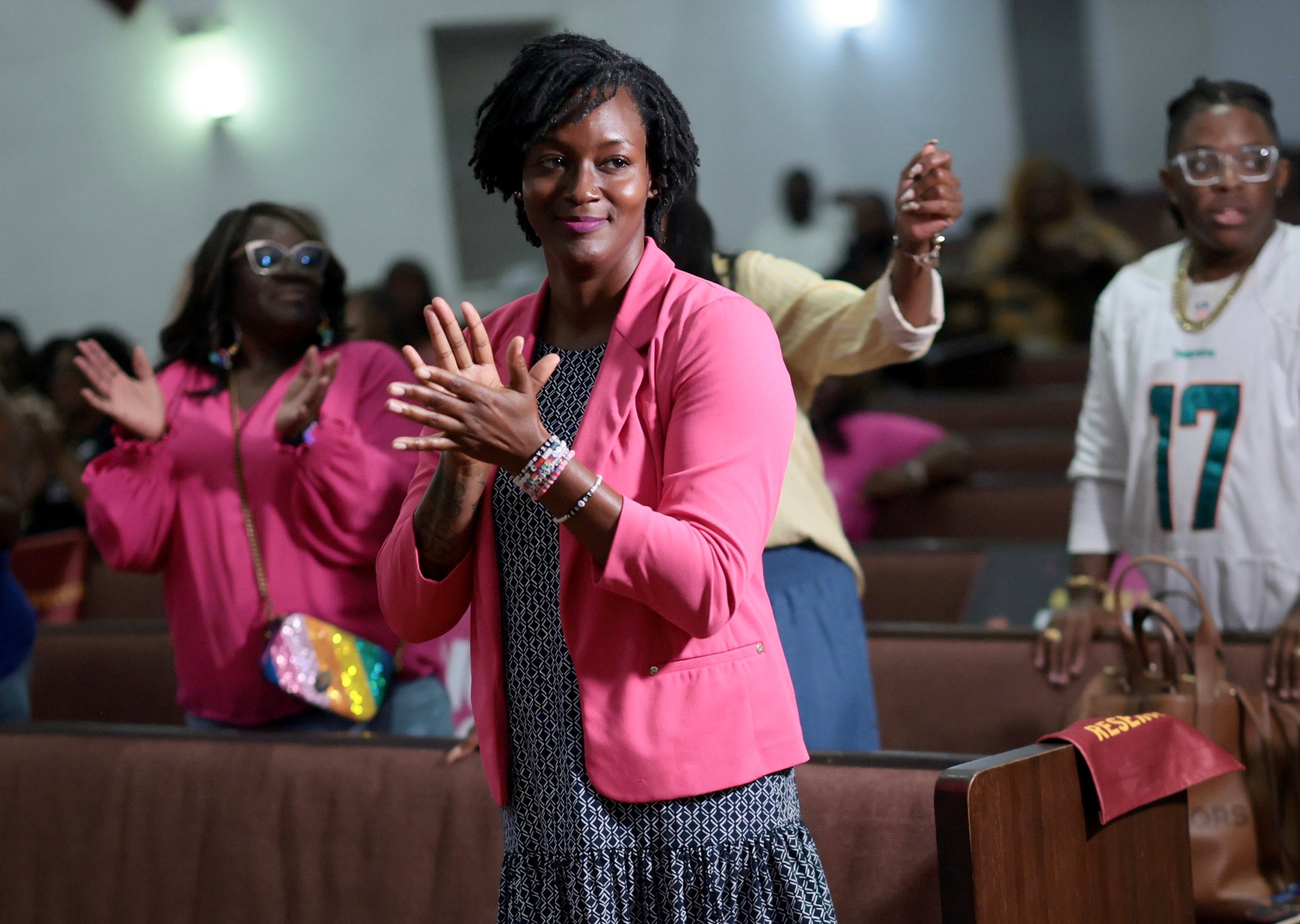 Democratic U.S. Senate candidate Florida state Rep. Angie Nixon participates in a worship service during a visit to the Ebenezer Missionary Baptist Church, August 17, 2026, in Hallandale Beach, Florida.Joe Raedle/Getty Images
