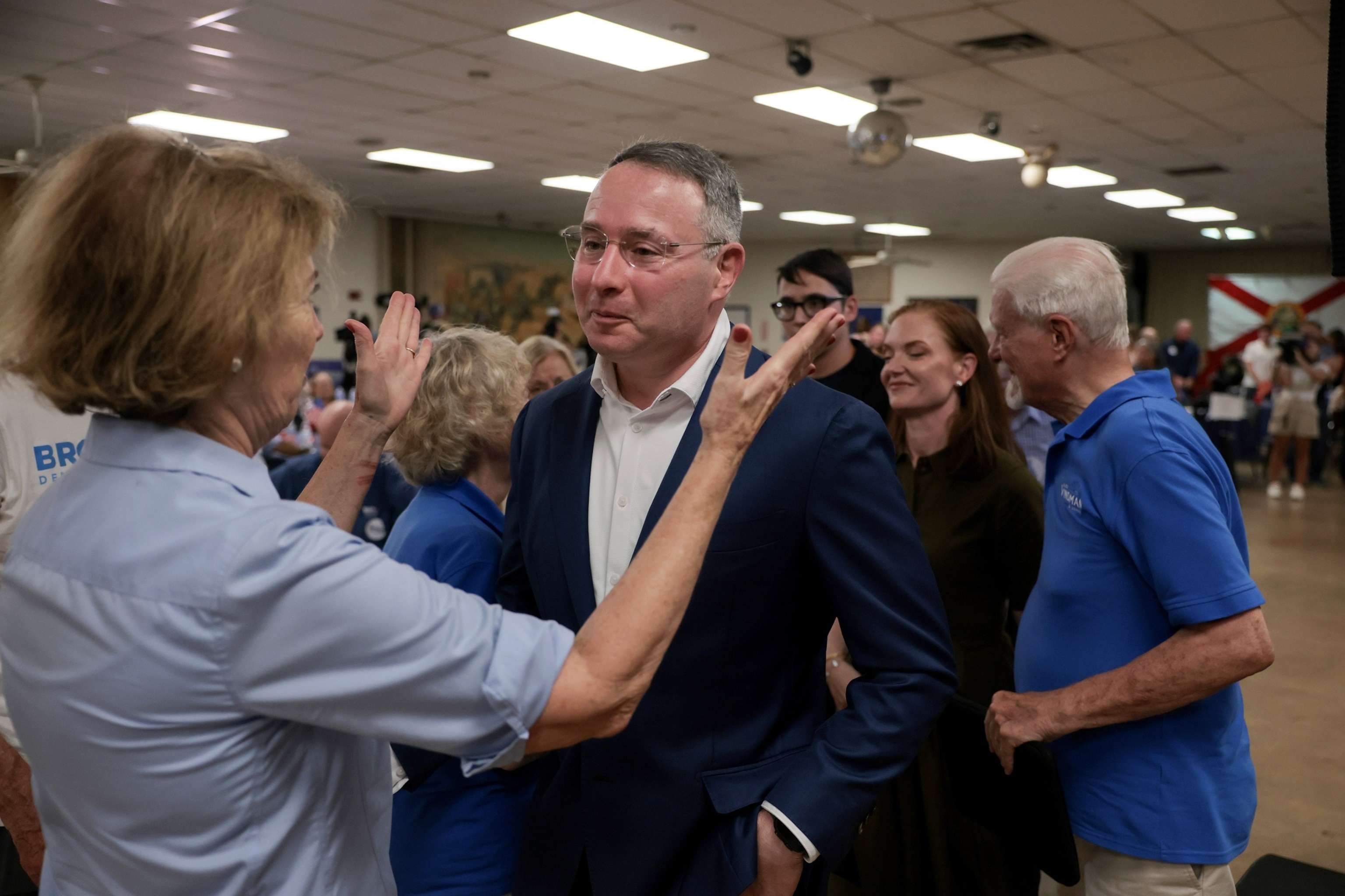 Florida Democratic Senate candidate, retired Army Lt. Col. Alex Vindman, receives well-wishes from supporters at a primary election-night watch party after conceding to his opponent, Florida State Rep. Angie Nixon, at an election-night watch party, August 18, 2026, in Oakland Park, Florida.Joe Raedle/Getty Images