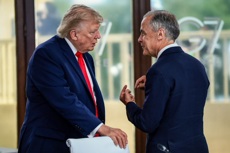 President Donald Trump speaks with Canadian Prime Minister Mark Carney in June.Evelyn Hockstein / Pool via Getty Images file
