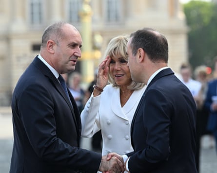 Rumen Radev (left) meeting the French prime minister, Sébastien Lecornu, and the first lady, Brigitte Macron, for the Bastille Day military parade in Paris on 14 July.Photograph: Jeanne Accorsini/Sipa/Shutterstock