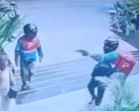CCTV footage shows the shooting of Nadia Beller by two men dressed as delivery riders in Santa Cruz de la Sierra.Photograph: Video obtained by Reuters/Reuters