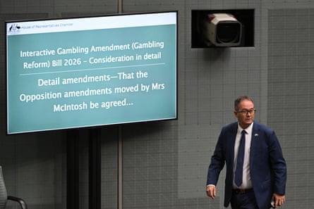 Queensland LNP MP Andrew Wallace crosses the floor to vote against the gambling reform bill.Photograph: Lukas Coch/AAP