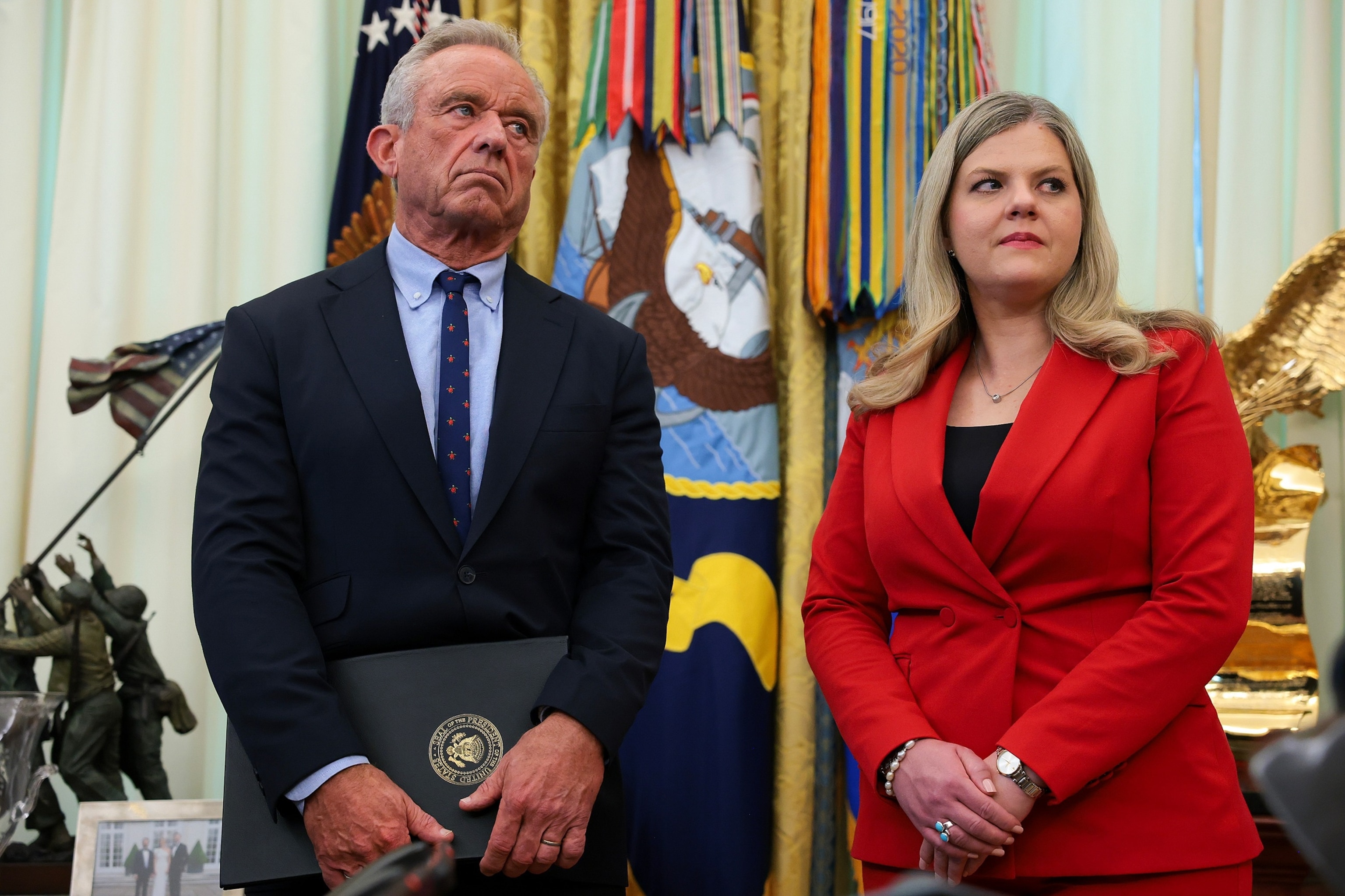 Health and Human Services Secretary Robert F. Kennedy Jr. and Deputy Assistant to the President for Domestic Policy Dr. Heidi Overton attend an executive order in the Oval Office at the White House, August 10, 2026 in Washington.Anna Moneymaker/Getty Images