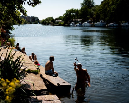 Swimmers enjoying London’s first official river bathing site on the Thames in July.Photograph: Jordan Pettitt/PA