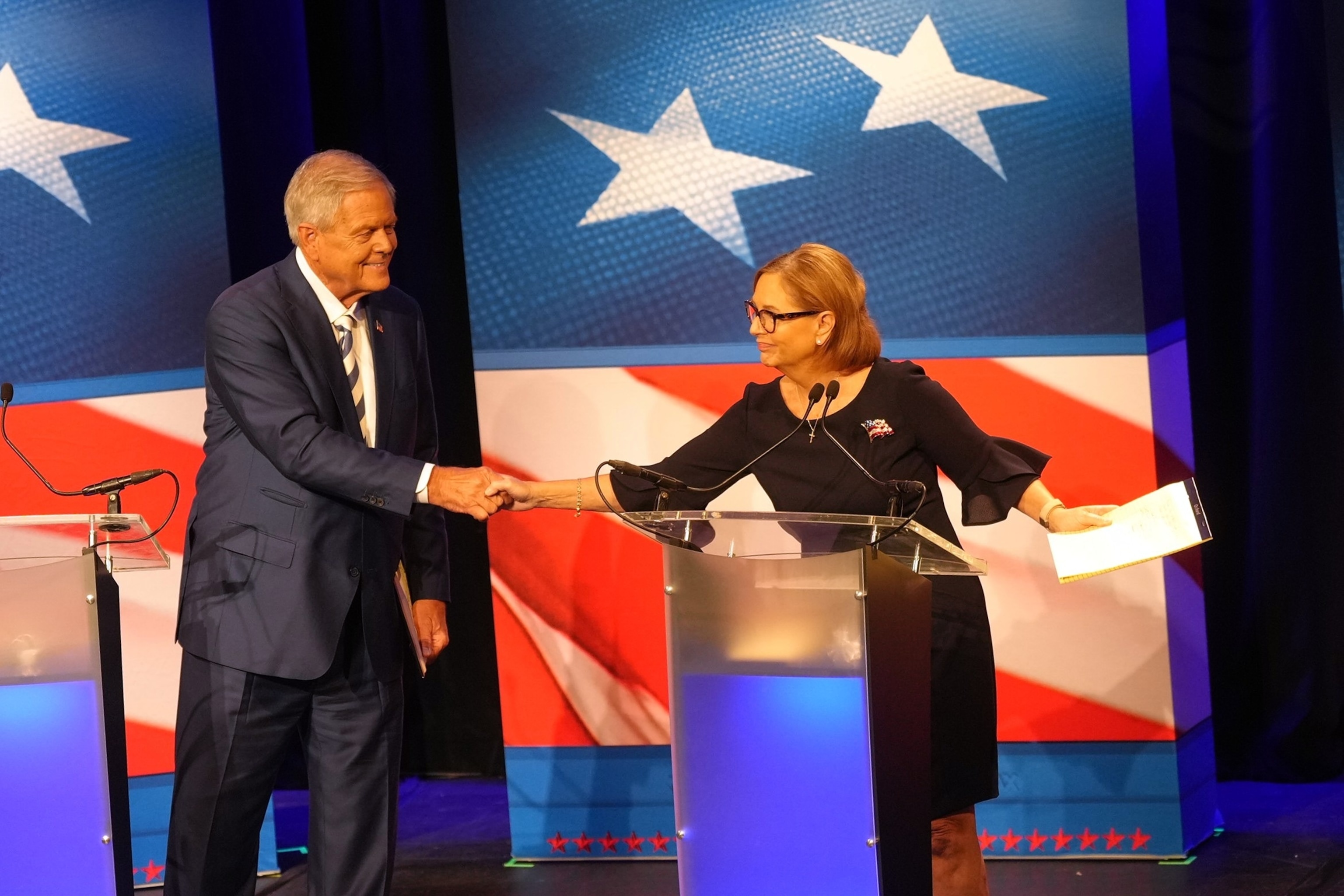 Rep. Ralph Norman shakes hands with Sen. Darline Graham during a debate ahead of the special GOP Senate runoff election to replace the late Sen. Lindsey Graham, in Newberry, S.C., Aug. 18, 2026.Meg Kinnard/AP Photo