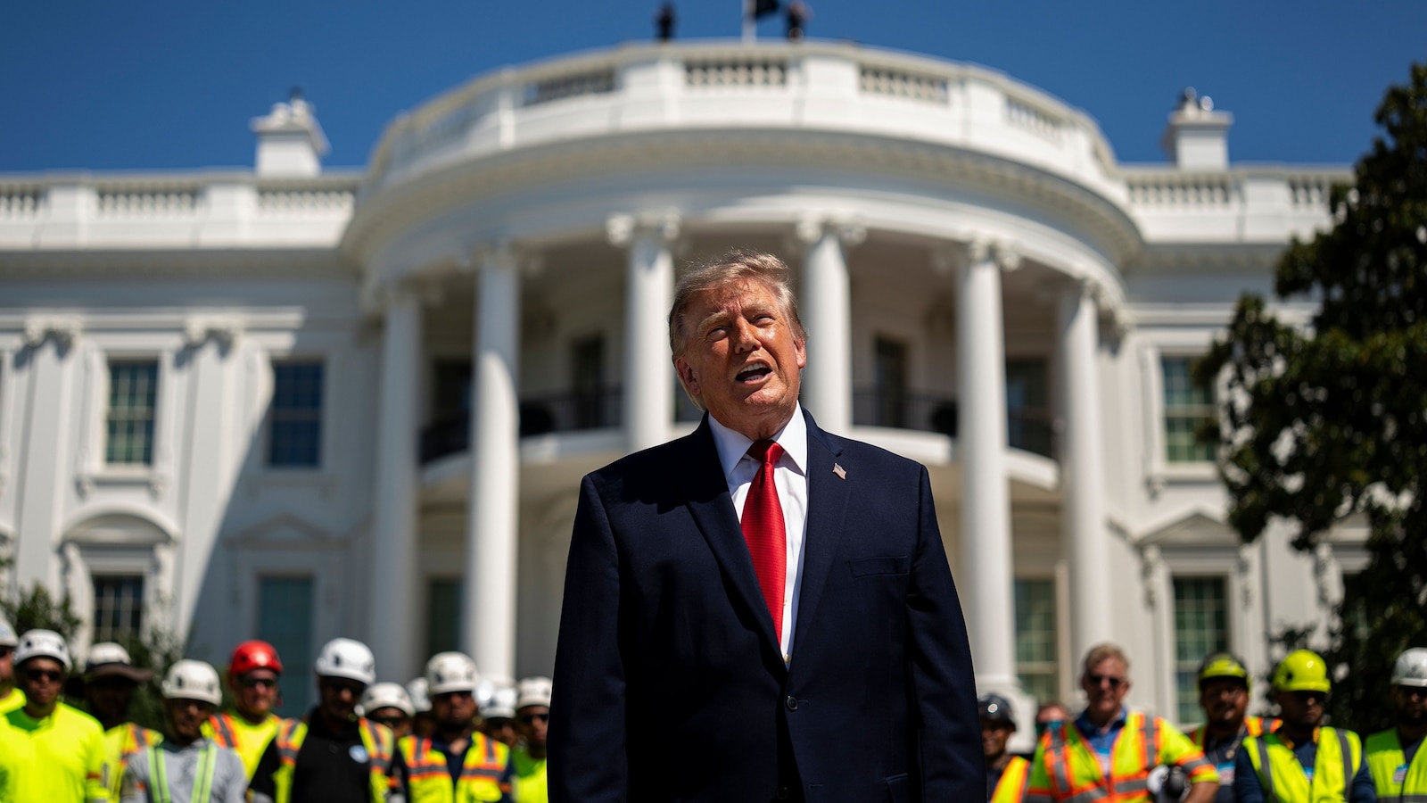 President Donald Trump speaks to members of the media while touring the White House helipad construction on the South Lawn of the White House in Washington, August 19, 2026.Al Drago/EPA/Shutterstock