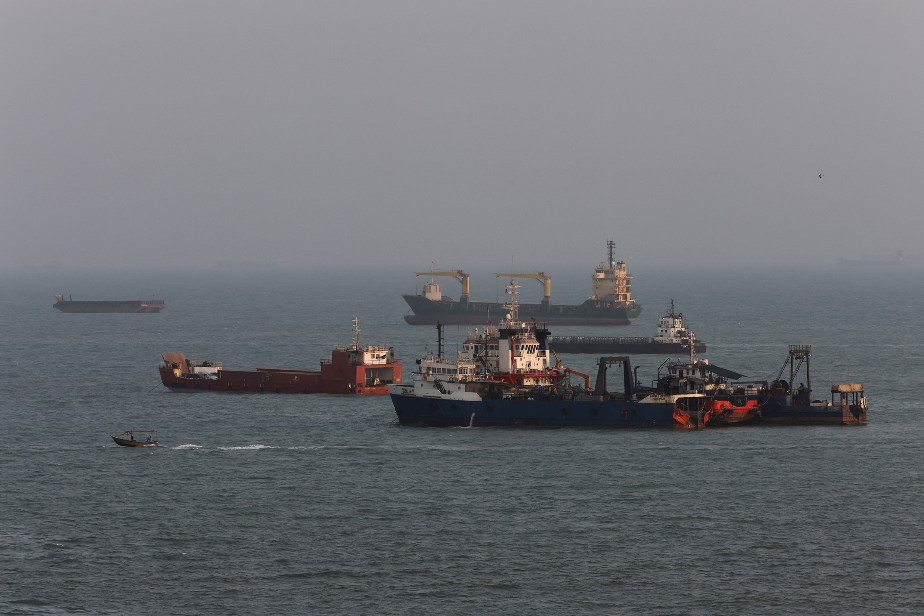 Ships are anchored in the Strait of Hormuz, Aug. 10, 2026, off the coast of Bandar Abbas, Iran.Ali Saeedi/Getty Images