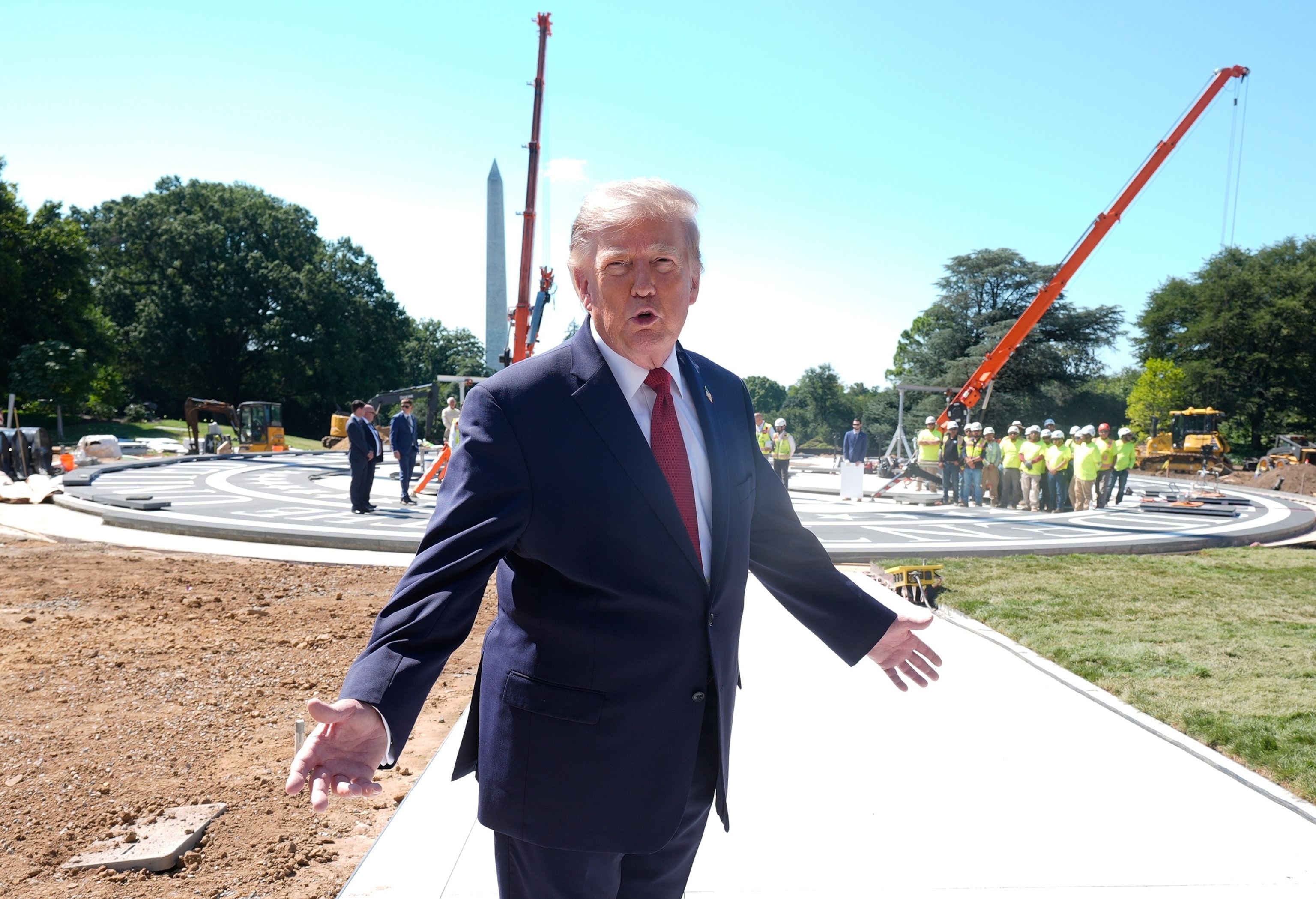 President Donald Trump speaks to the press at the construction site of a helipad on the South Lawn of the White House in Washington, August 19, 2026.Manuel Balce Ceneta/AP Photo
