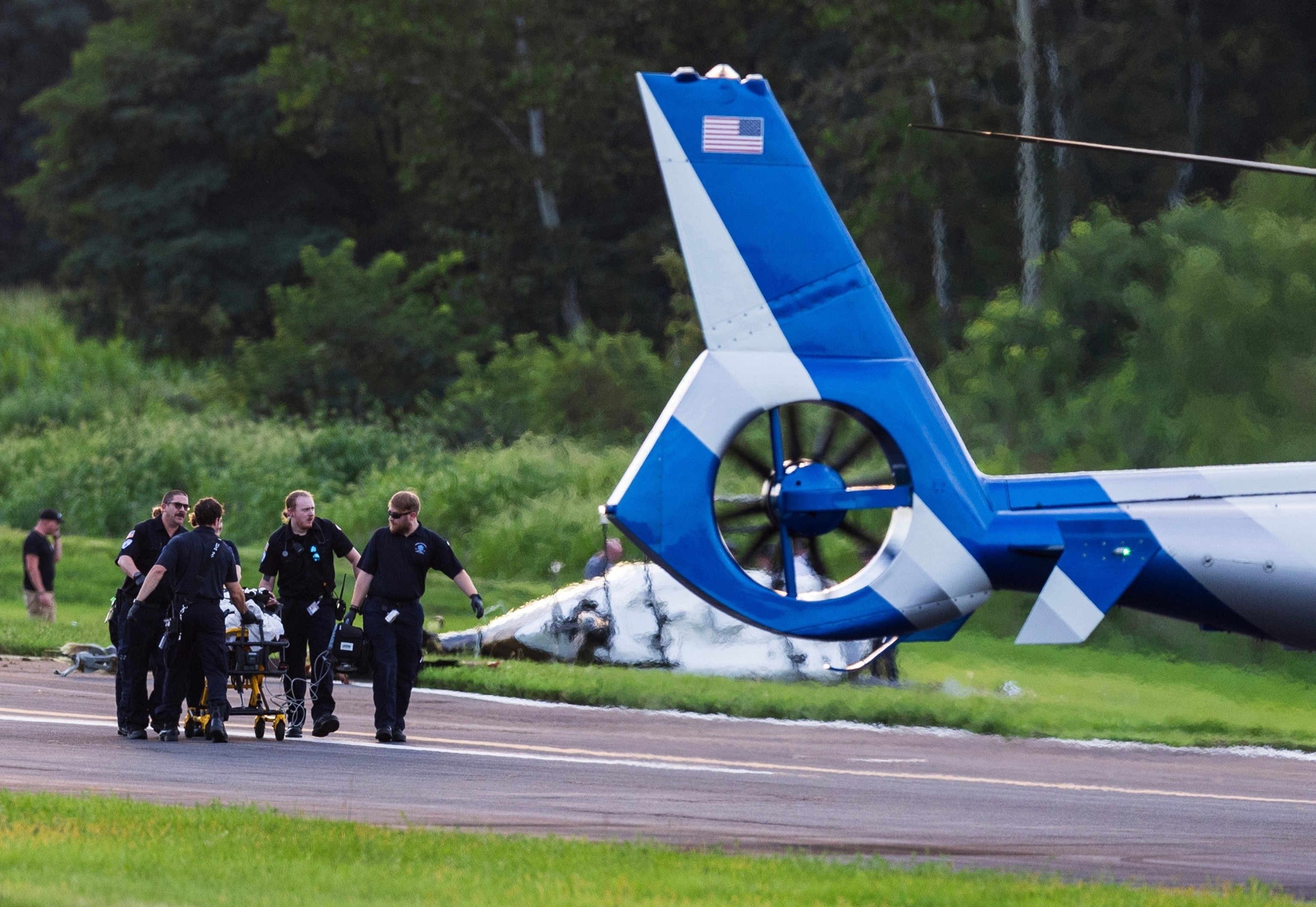 Authorities investigate a crash between a Pennsylvania State Police helicopter and a small plane at the Carlisle airport in Carlisle, Pa. Wednesday, Aug. 19, 2026.Sean Simmers/The Patriot-News via AP