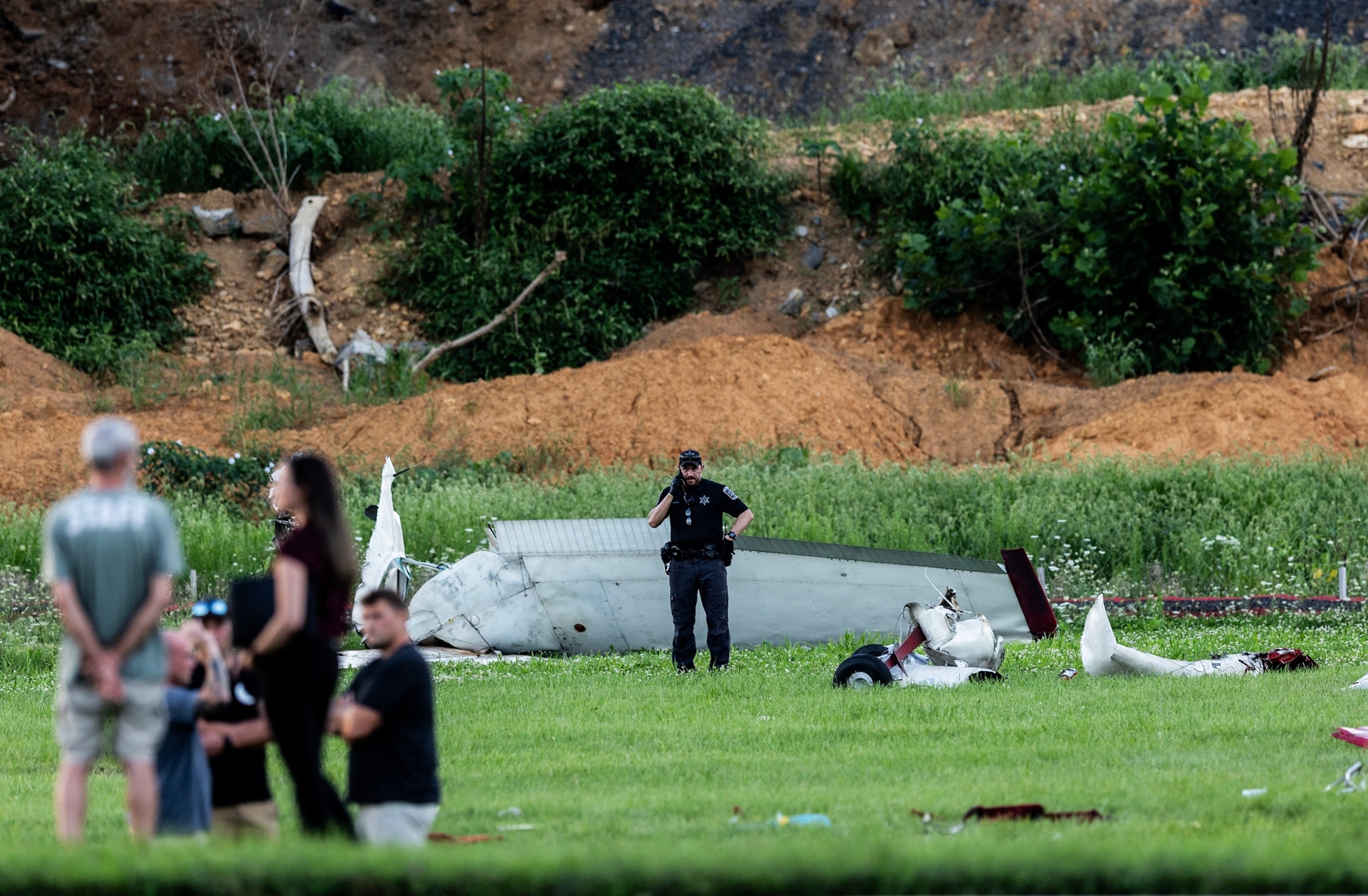 Authorities investigate a crash between a Pennsylvania State Police helicopter and a small plane at the Carlisle airport in Carlisle, Pa. Wednesday, Aug. 19, 2026.Sean Simmers/The Patriot-News via AP