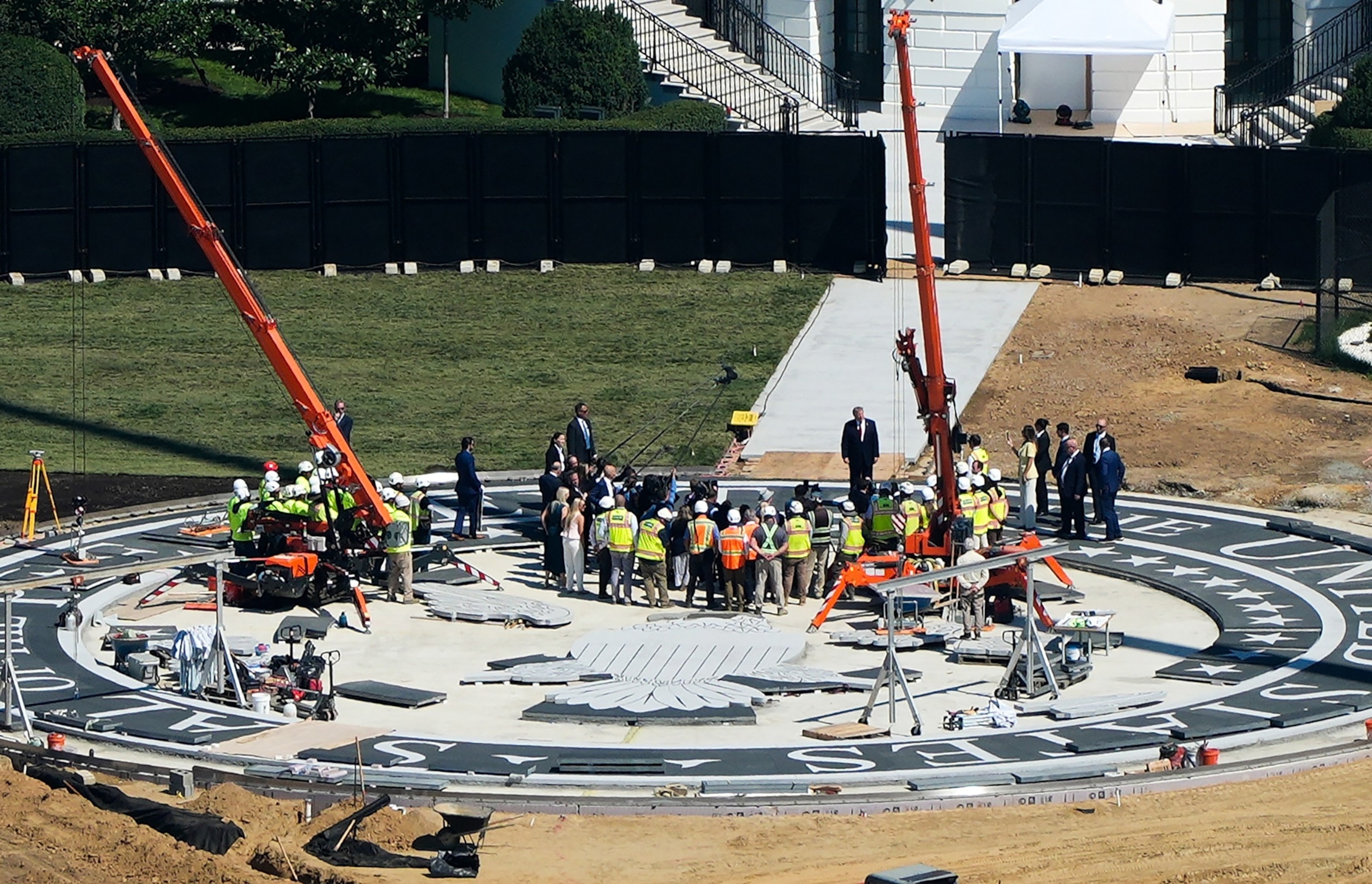 President Donald Trump speaks on the South Lawn of the White House at the construction site of the new helicopter landing zone, Aug. 19, 2026, seen from the Washington Monument in Washington.Alex Brandon/AP Photo