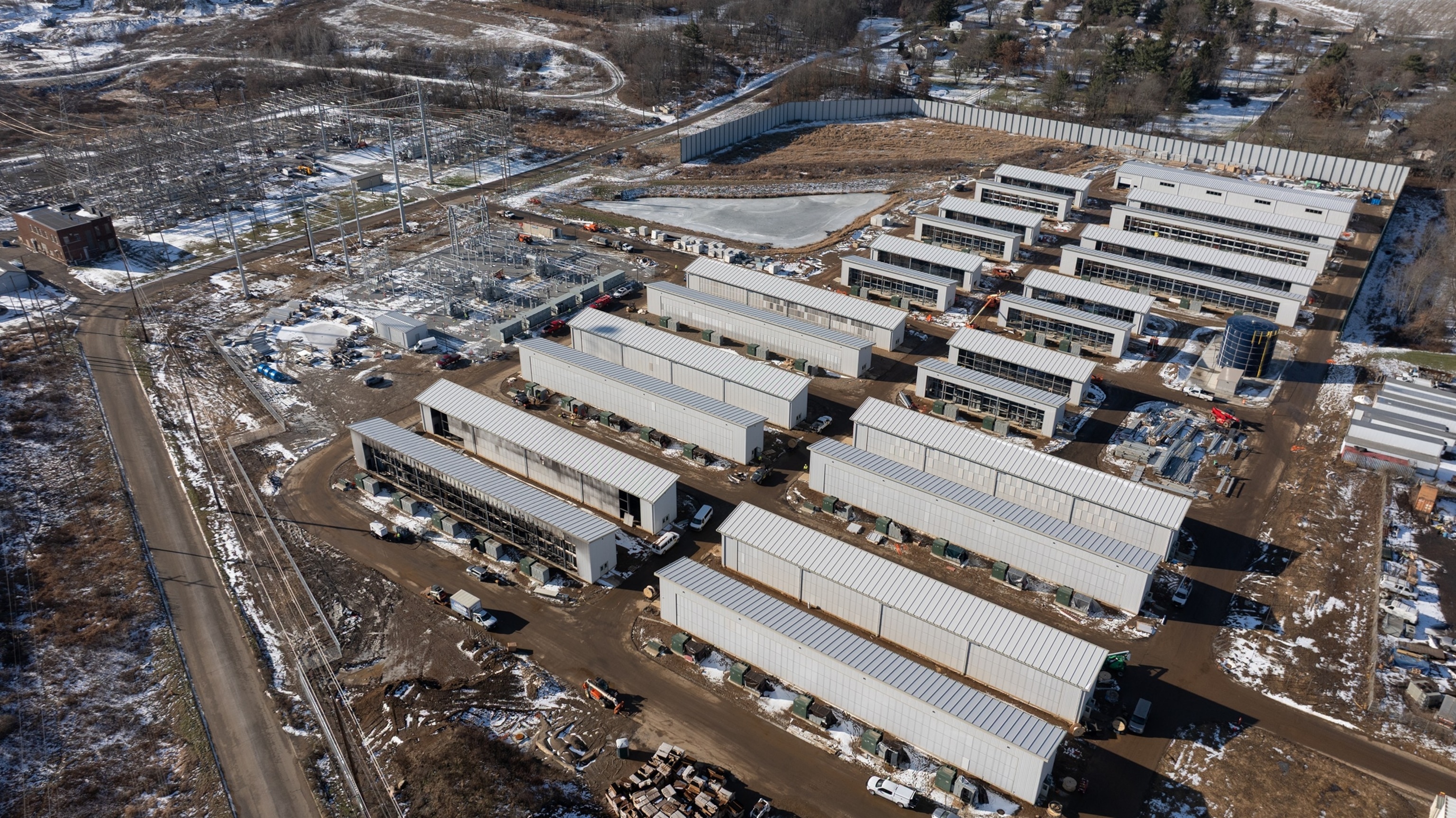 A building sustained fire damage, left, in November at the Bitdeer Technologies Group cryptocurrency mining data center while under construction in Massillon, Ohio, Dec. 18, 2025.Justin Merriman/Bloomberg via Getty Images