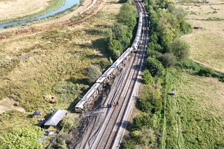 An aerial view of the derailed train in East Sussex.Photograph: Network Rail/PA