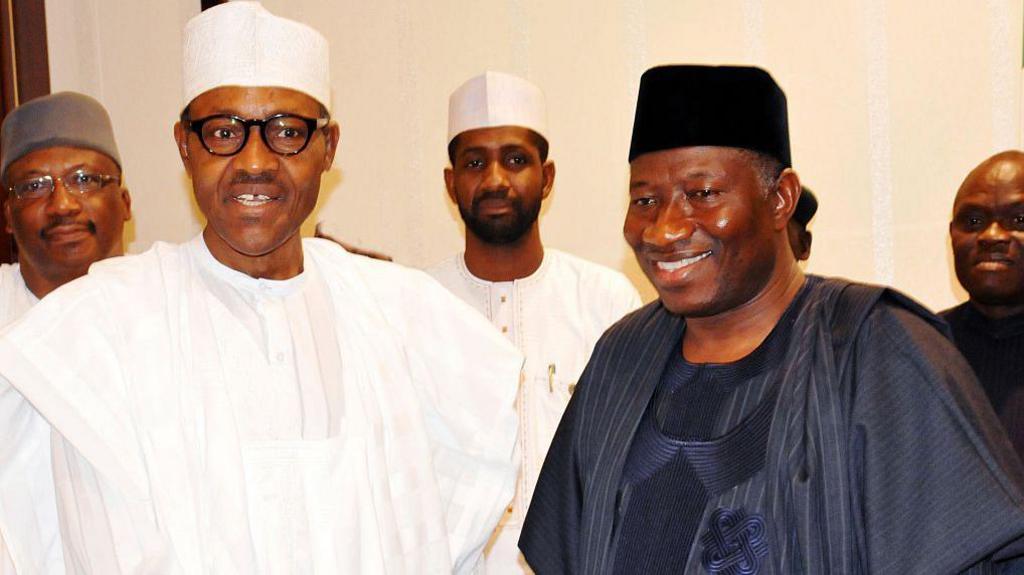 Image caption,Goodluck Jonathan (R) handed power over to Muhammadu Buhari (L) in 2015 after losing the election - a defeat that started the PDP's decline