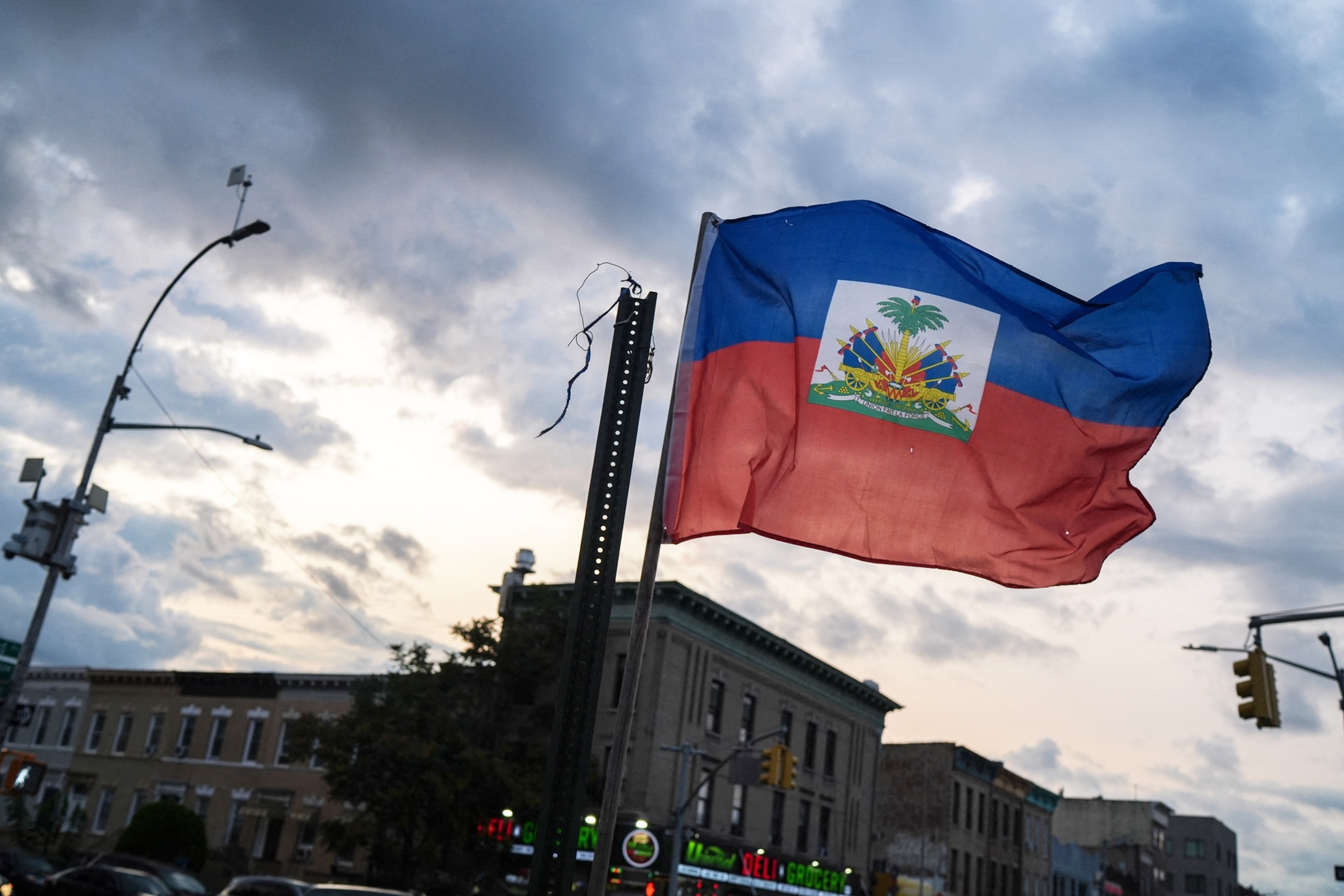 A Haitian flag is is seen flying in the Little Haiti neighborhood of Brooklyn, New York, on July 29, 2026.Ryan Murphy/AFP via Getty Images, FILE