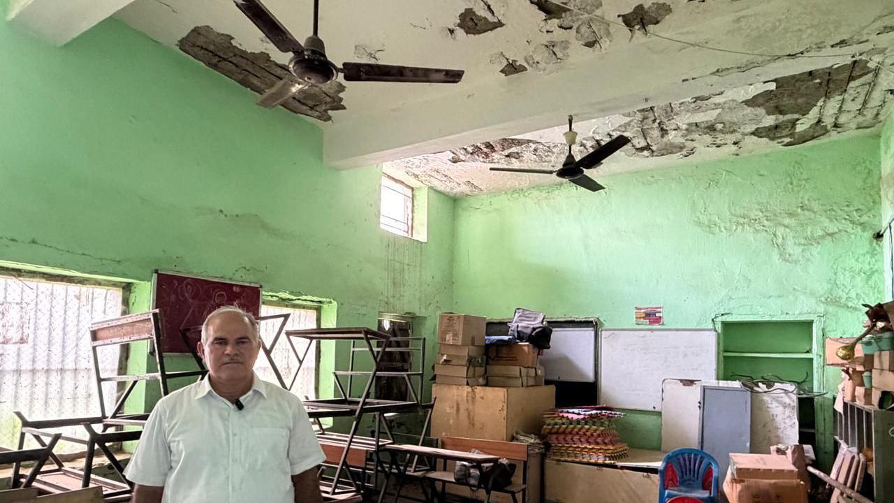 Image caption,Falling plaster from ceiling has forced this school to abandon four of the nine classrooms