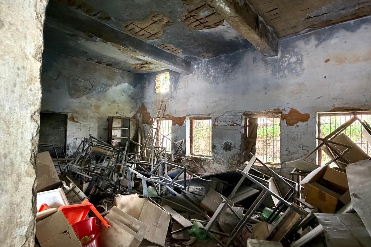 Image caption,The abandoned classrooms are full of broken benches and discarded boxes