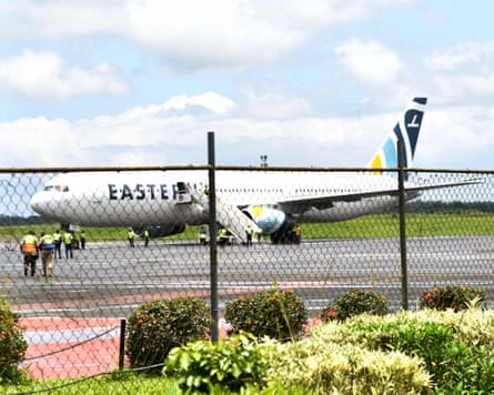 A plane carrying the deportees from the US arrives at Roberts international airport, outside Monrovia, Liberia, on Thursday.Photograph: Alexander Wiaplah/AP