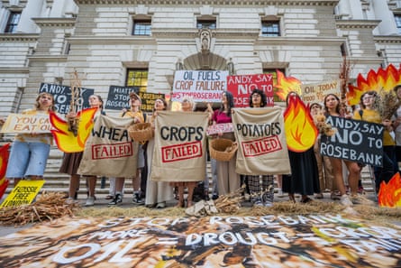 Campaigners from Fossil Free London staged a demonstration in front of the Treasury on Monday.Photograph: Guy Bell/Shutterstock