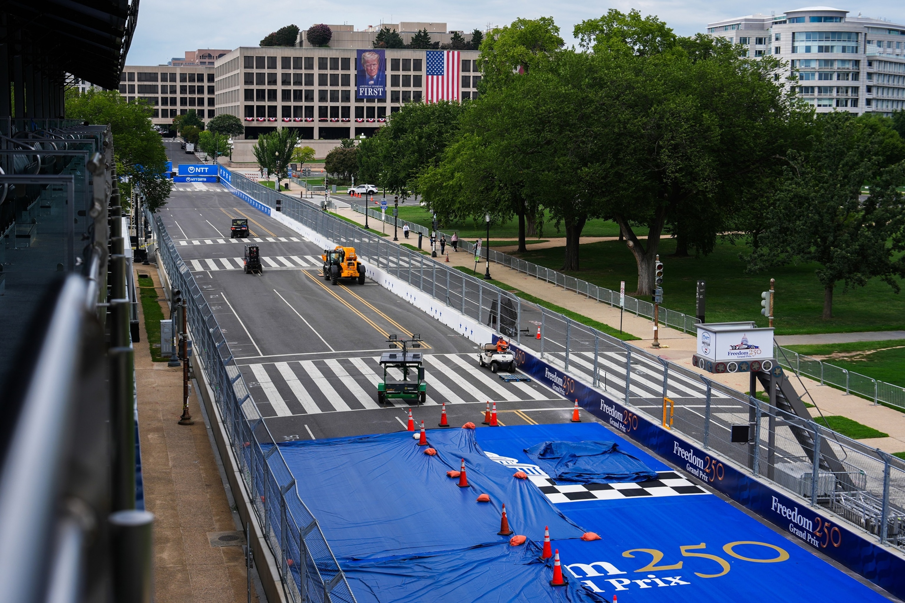 The presidential limousine known as "The Beast" makes a lap around the 1.66-mile track with President Donald Trump and first lady Melania Trump aboard before the start of the Freedom 250 Grand Prix IndyCar race in Washington, D.C., August 23, 2026.Kevin Dietsch/Getty Images