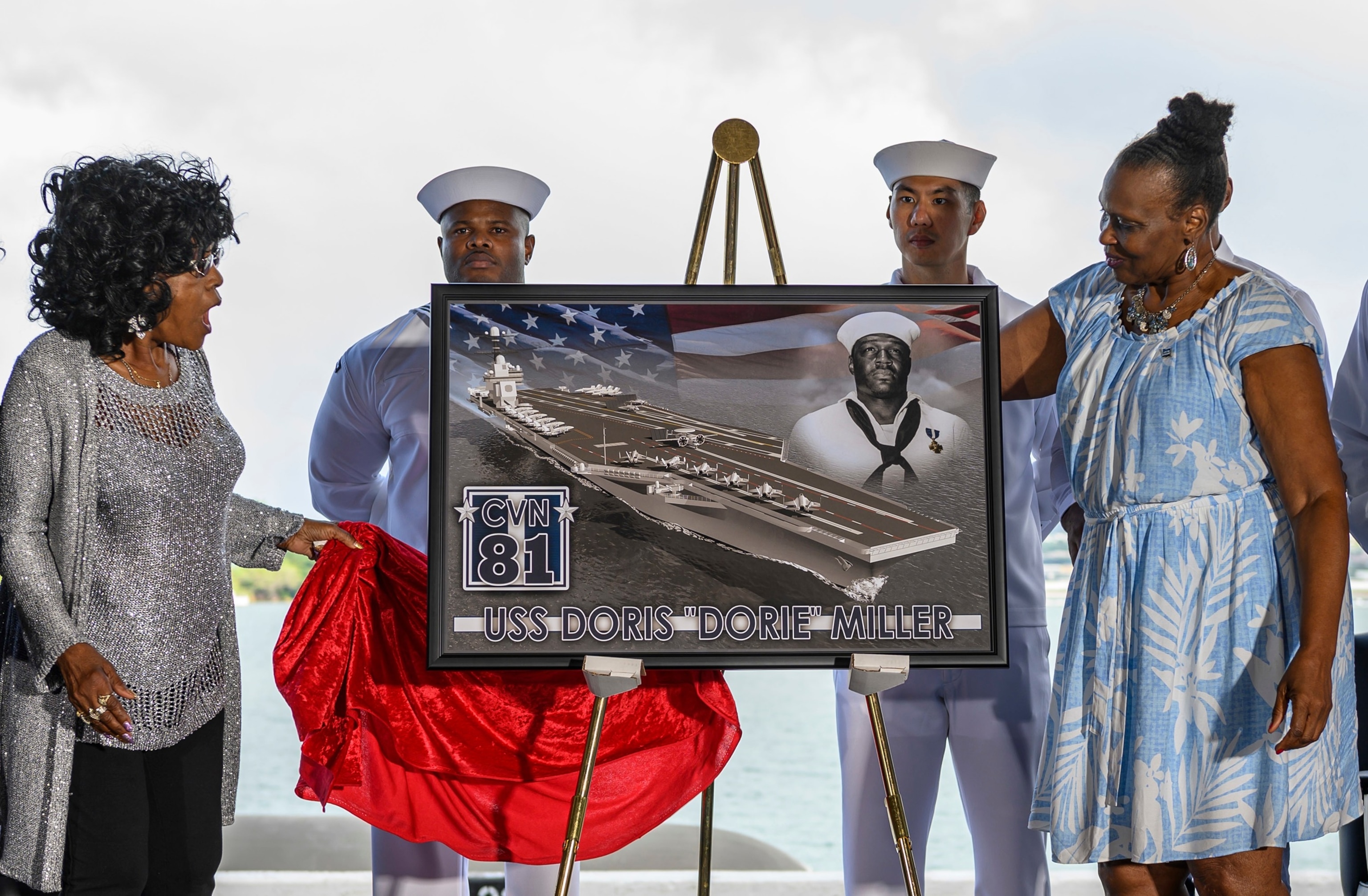 Family members of World War II hero Doris "Dorie" Miller react after the unveiling of the new Ford-class aircraft carrier USS Doris Miller at a Martin Luther King Day celebration event on Joint Base Pearl Harbor-Hickam, Jan. 20, 2020.Specialist 2nd Class Alexander C. Kubitza/US Navy