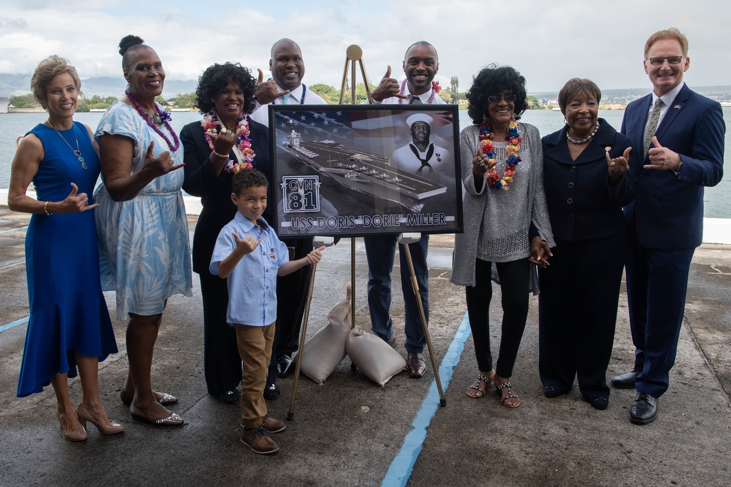 Acting Secretary of the Navy Thomas B. Modly poses for a group photo with the Miller family after the unveiling of the new Ford-class aircraft carrier USS Doris Miller at a Dr. Martin Luther King Jr. Day event on Joint Base Pearl Harbor-Hickam, Jan. 20, 2020.Petty Officer 2nd Class Molly Crawford/US Navy